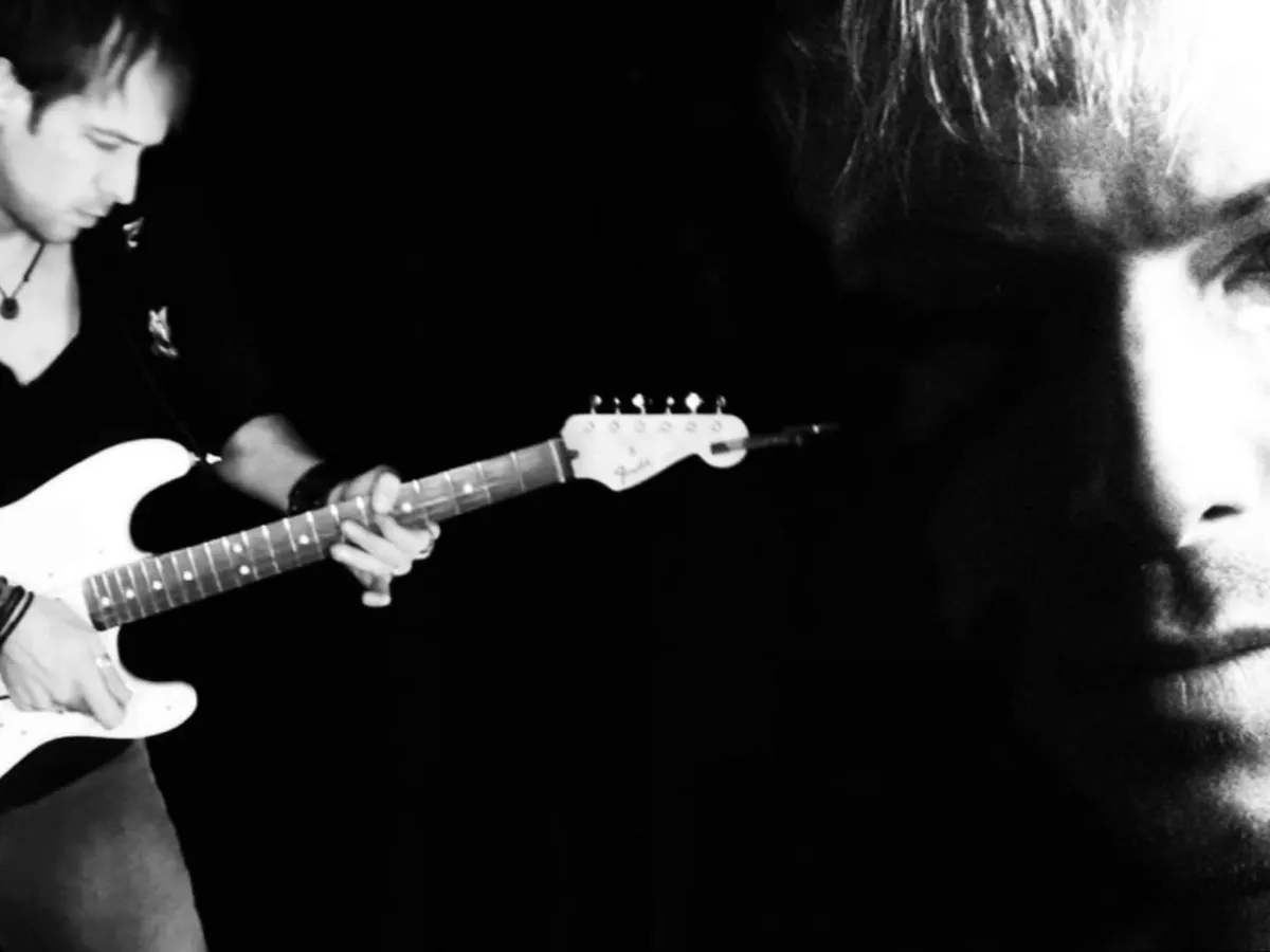 Black-and-white montage of Adam Wallington playing guitar and a close-up portrait.